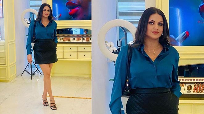 Himanshi Khurana Flaunts Her Sizzling Avatar In Turquoise Shirt And Black Skirt. View Pictures